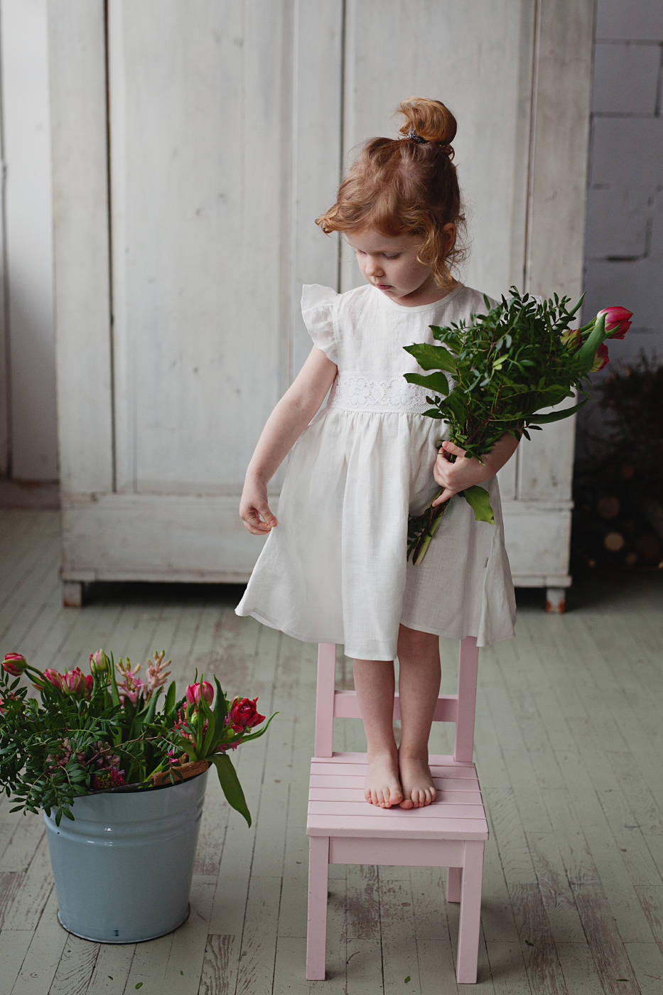 White children dress for wedding